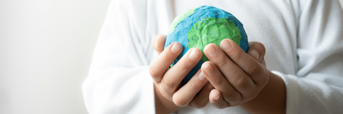 Young student holding a globe