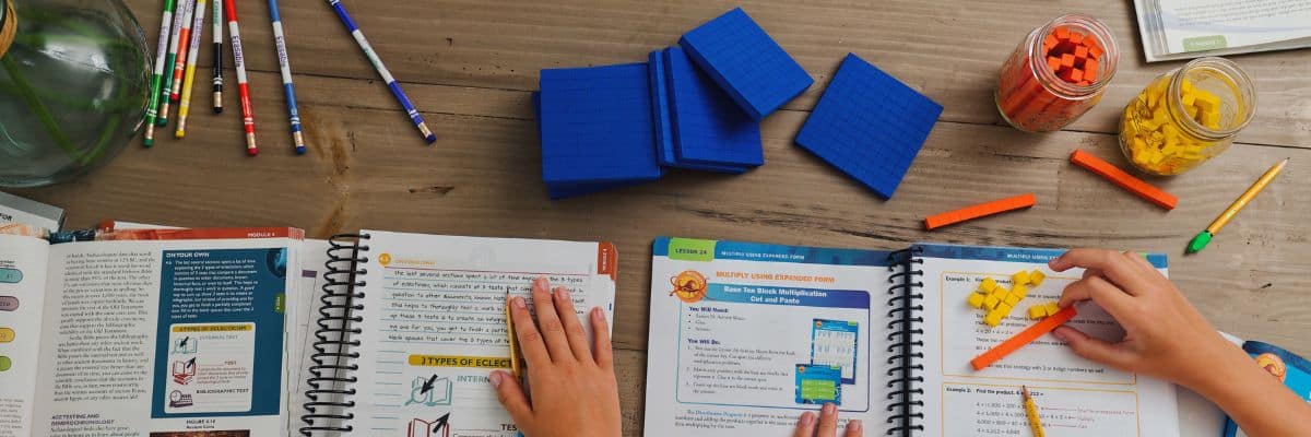 Apologia curriculum books on a homeschool table